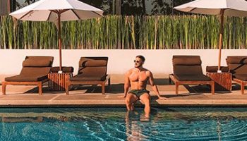 gay-Luxury-Hotel-with-Outdoor-pool-riverside-Anantara-Chiang-Mai-Resort