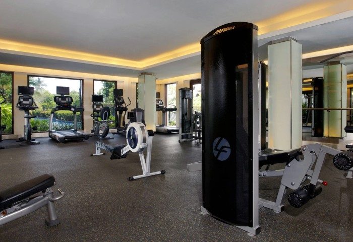 JW Marriott Khao Lak Resort & Spa fitness center. Treadmills, elliptical machines, and weight machines. Perfect for gay men's travel fitness needs.