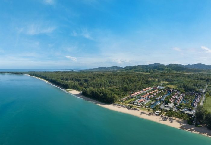 Aerial view of JW Marriott Khao Lak Resort & Spa's unrivaled beachfront. A gay-friendly Thailand travel destination with classic Thai architecture.